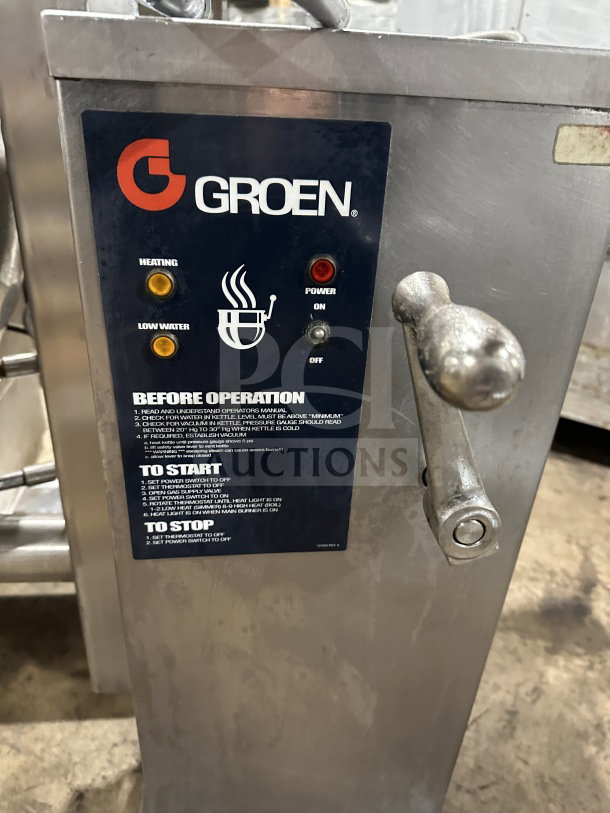 Groen DH/1-40 tilting steam kettle; stainless steel, natural gas, 40-gal capacity, 120V, with operation panel and handle.