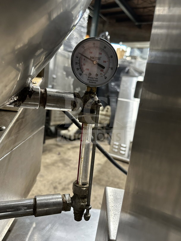 Groen DH140 commercial stainless steel 40-gal tilting steam kettle, natural gas, 120V, 1 phase, on legs. Features pressure gauge.