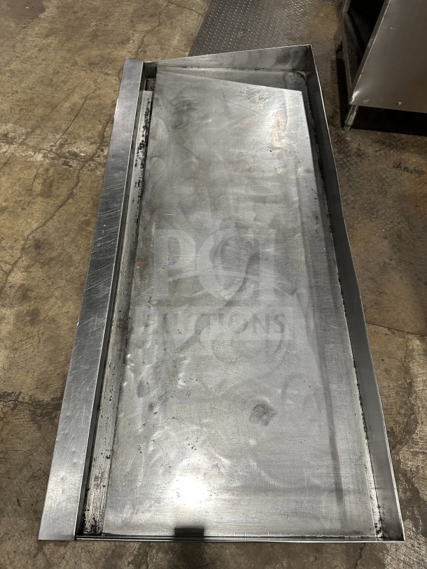 Garland Model 60.5 stainless steel gas griddle on legs, used, showing surface wear, ideal for commercial kitchens.