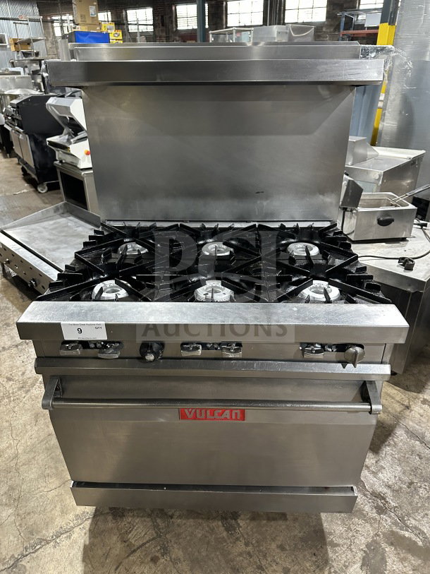 Vulcan 36L commercial stainless steel gas-powered range/oven combo, 36" French top, 6-burner, with backsplash and overhead shelf.