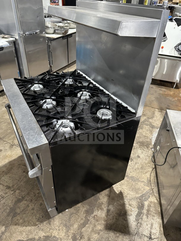 Vulcan Model 36L commercial stainless steel range, 6-burner French top, oven combo, with backsplash, salamander shelf, on casters.