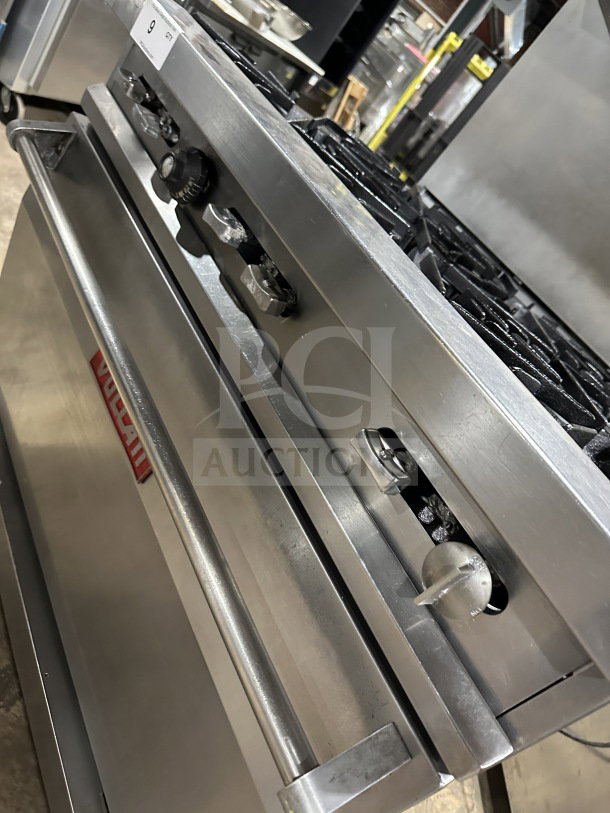 Vulcan 36" stainless steel gas range/oven, model 36L, 6-burner, French top, salamander shelf, on casters, SN 481138903.