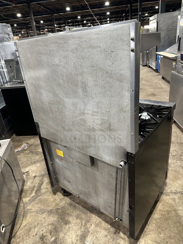 Vulcan 36L commercial 36" stainless steel French top range/oven combo with backsplash and salamander shelf, on casters.