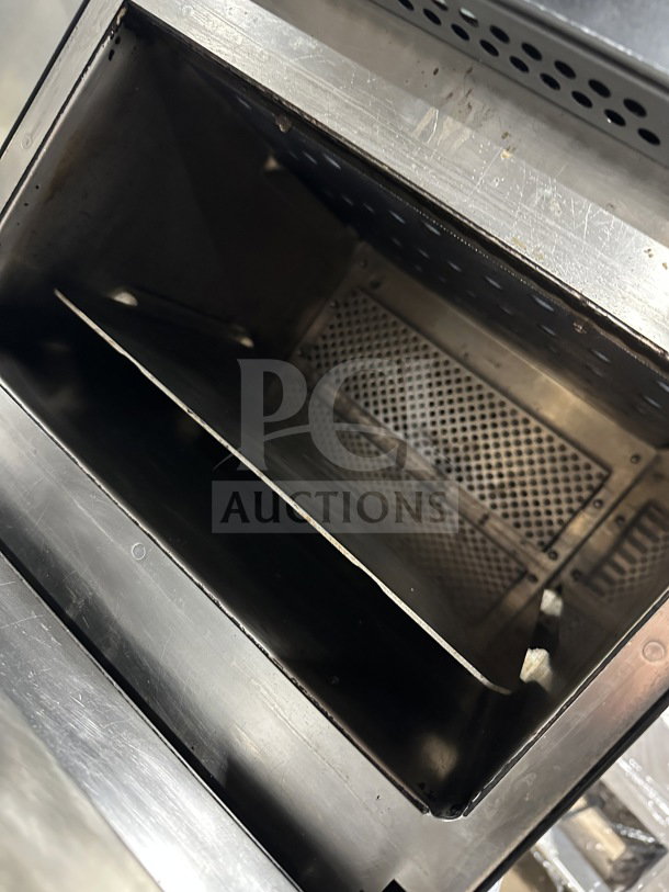 MerryChef Eikon E2S commercial rapid cook oven, black, electric-powered, used condition, inner cooking chamber view.