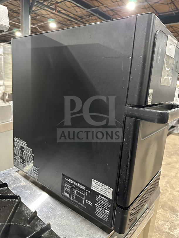 MerryChef Eikon E2S high-speed countertop oven, black, electric-powered, commercial use, visible model labels, good condition.