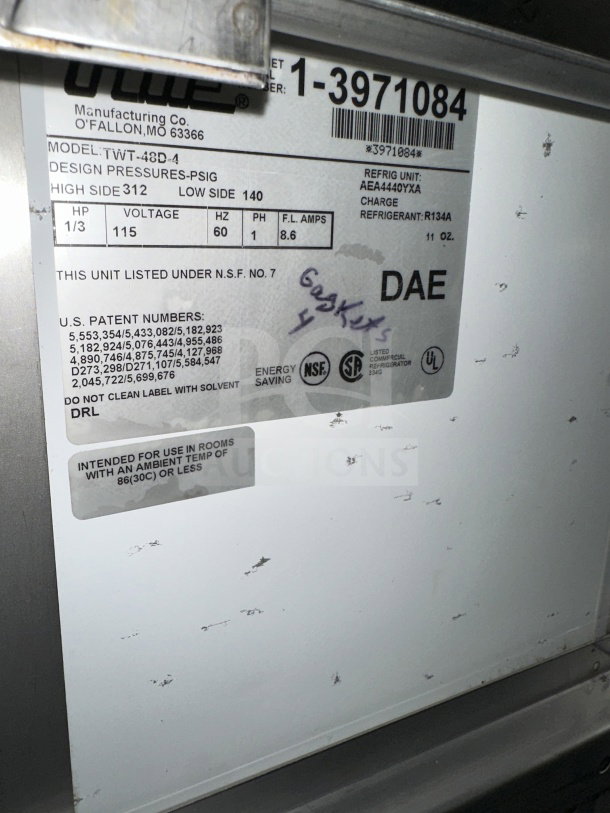 True TWT-48D-4 4-drawer stainless steel worktop table/refrigerator, Energy Star certified, SN: 1-3971084, 115V, on casters.