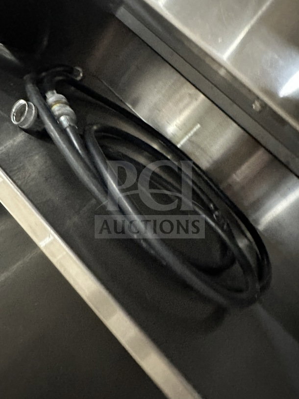 Randell RAN HTD-4S steam table cord close-up; stainless steel, electric-powered, commercial use, visible wiring.