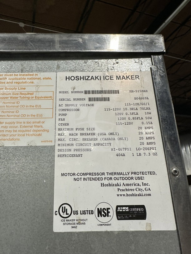 Randell stainless steel 4-well electric steam table with sneeze guard, model RANHTD4S. Includes 2-shelf storage, on casters. 120V, 1 Phase.