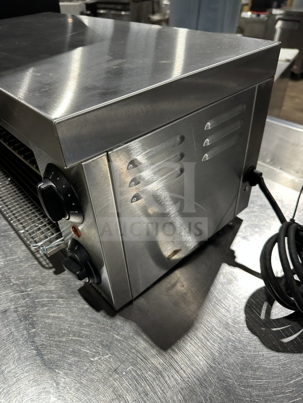 Adcraft CHM1200W stainless steel cheese melter, 24", 120V; excellent condition with power cord, side control knobs visible.