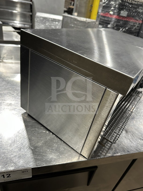 Adcraft CHM1200W cheese melter, 24" stainless steel, electric, excellent condition, model number and serial number visible.