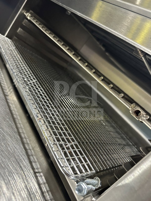 Adcraft CHM1200W commercial stainless steel 24" cheese melter, electric, excellent condition, visible wire rack and heating elements.