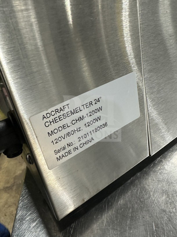 Adcraft CHM-1200W commercial 24" stainless steel cheese melter, 120V, model CHM1200W, serial number 21011180036, made in China.