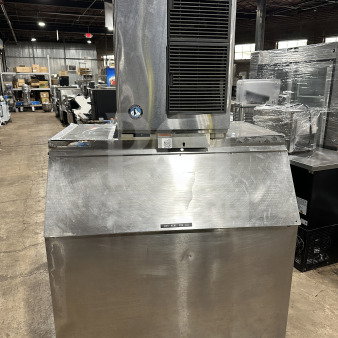 Hoshizaki KM-515MAH stainless steel ice maker, air-cooled, electric powered, SN: B04669A. On legs, commercial use.