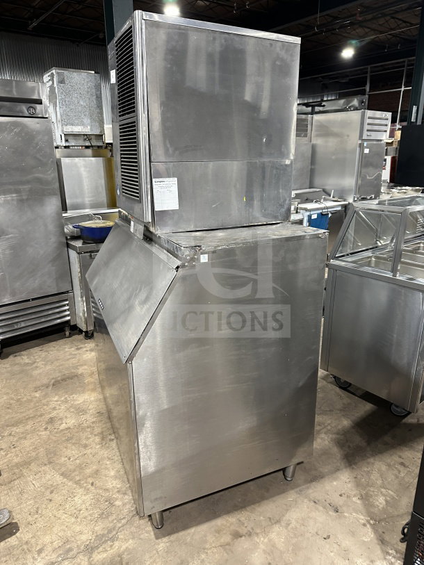 Hoshizaki KM-515MAH ice maker, stainless steel, air-cooled, on legs, model and serial labels visible, good condition.