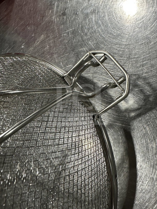 Brand new commercial 12" double mesh stainless steel bowl strainer, durable design, close-up view of mesh and handle.