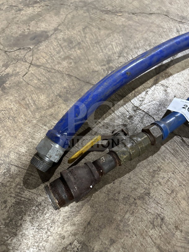 Dormont blue commercial movable gas connector hose, used condition, with metal fittings and valve, visible wear.