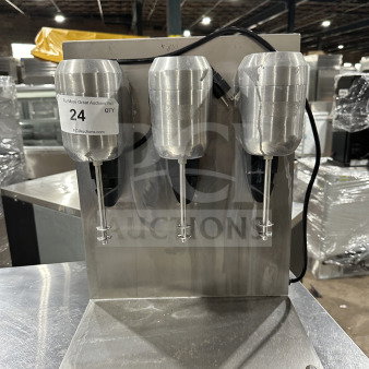 Commercial stainless steel triple-spindle drink mixer, excellent condition, numbered tag "24," sturdy construction.
