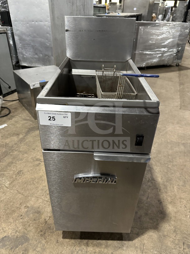 Imperial commercial stainless steel electric deep fat fryer with backsplash, basket hanger, and fry basket. On casters.