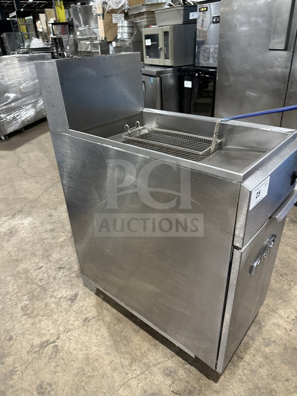 Imperial commercial stainless steel electric deep fryer with backsplash, basket hanger, fry basket, and casters.