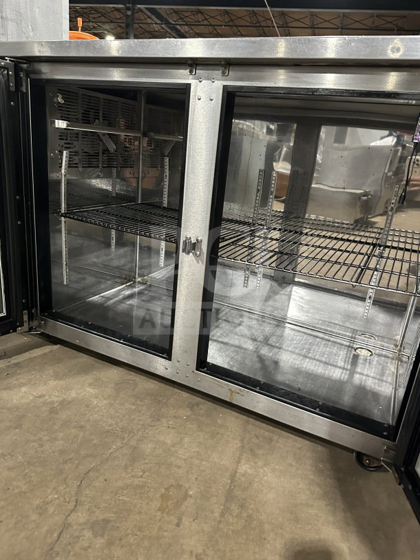 Perlick BBS60RM stainless steel 2-door bar cooler with chrome wire racks, glass doors, on casters, SN: 713287, 115V 1Phase.