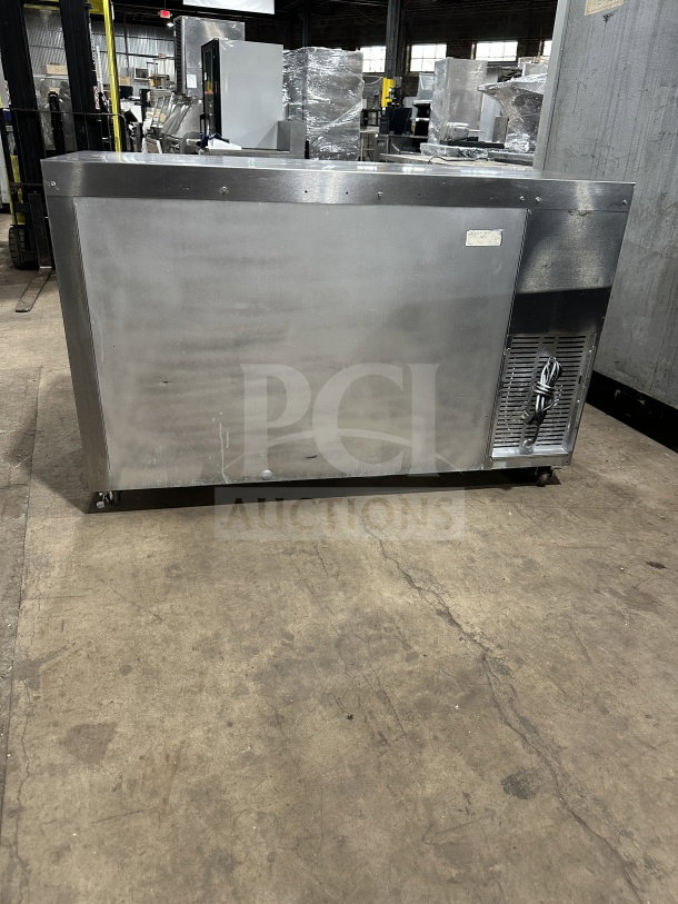 Perlick BBS60RM stainless steel two-door bar back cooler on casters, features chrome-plated wire rack, 115V 1-phase.