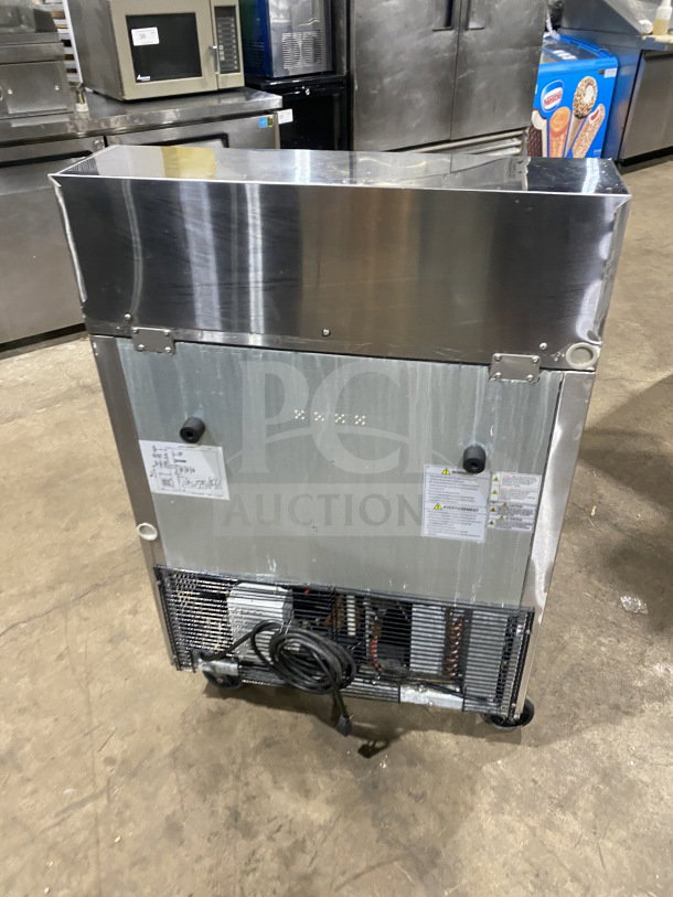 Turbo Air TST-28SD-D2-N prep table, stainless steel, 2-drawer, refrigerated, on casters. Model info and labels visible.