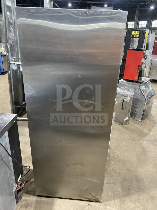 Leader LS54SC stainless steel reach-in refrigerator merchandiser with rear access sliding glass doors and poly-coated racks.