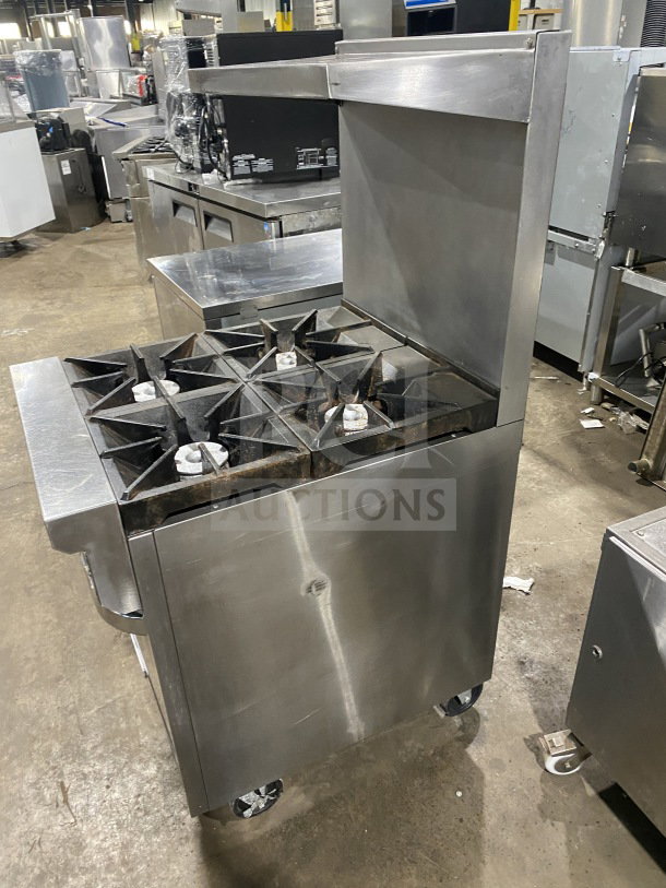 Southbend S241E commercial stainless steel 4-burner range/oven combo, natural gas, with backsplash, salamander shelf, casters.