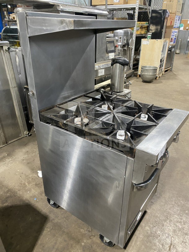 Southbend S241E commercial stainless steel range/oven combo, 4 burners, backsplash, overhead salamander shelf, on casters.