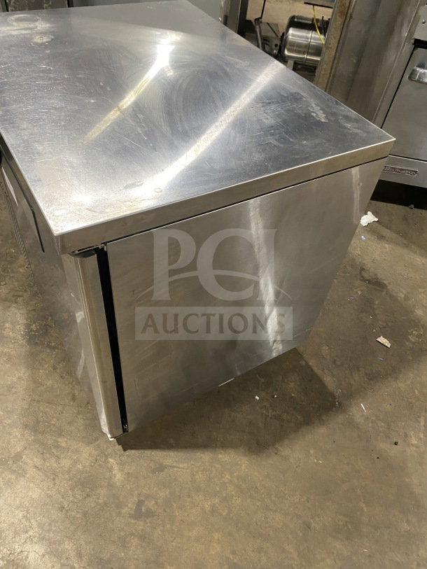Turbo Air JUR-36 stainless steel undercounter refrigerator with side mounted compressor, poly coated rack. Good condition.