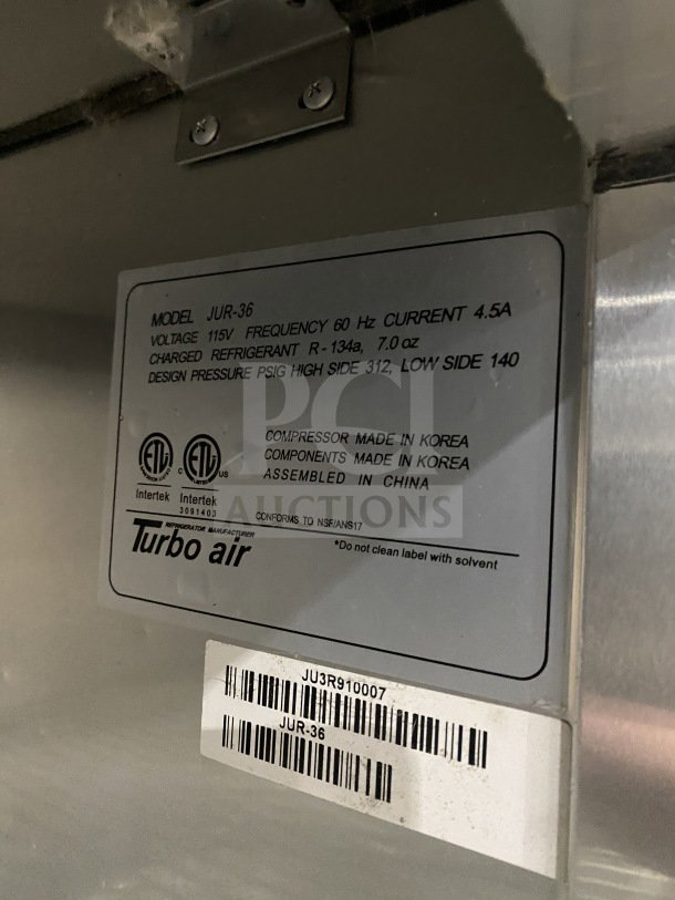 Turbo Air JUR-36 label with electrical specs. Model: JUR-36, Serial: JU3R910007, 115V. Conforms to NSF/ANSI7.