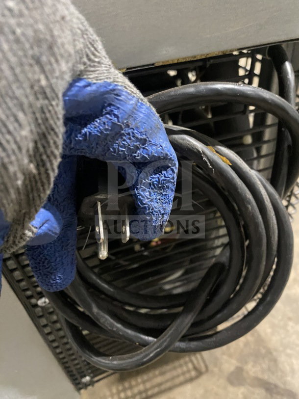 Turbo Air J-Series undercounter refrigerator cord and plug, model JUR-36, with visible side-mounted compressor.