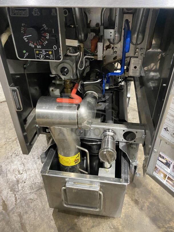 Pitco SFSG14JS commercial stainless steel natural gas fryer, 40 lb. capacity, with filtration system and casters.
