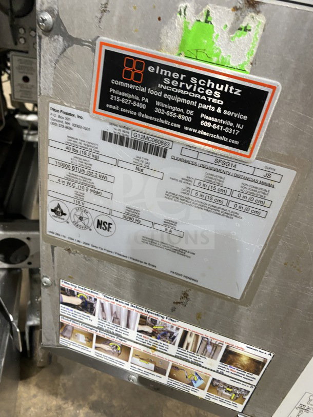 Pitco SFSG14JS 40 lb. commercial stainless steel natural gas fryer with backsplash, basket hanger, filtration system, and casters.