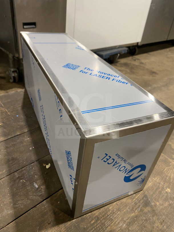 Brand new Vollrath 58821A stainless steel countertop cup dispenser cabinet, single-slot, protective film visible, model number seen.