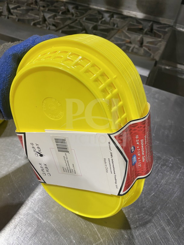 Brand new yellow WincoWinware PLB-Y fast food serving basket, oval shape, stack of 12, commercial use, dishwasher safe.