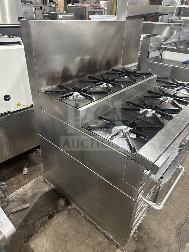 Jade Range TRLH02ST48 8-burner stainless steel commercial gas range with chef base, backsplash, and double flue riser on casters.