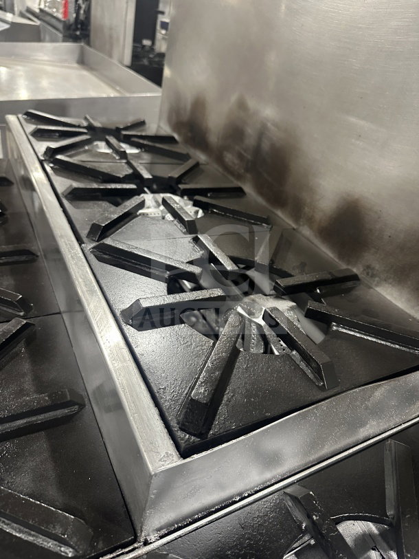 Jade Range TRLH-02S-T-48 8-burner stainless steel gas range with chef base, backsplash, and flue riser, model 63279.