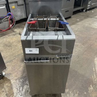 Dukers DCF3NG stainless steel deep fat fryer, natural gas, 40 lb capacity, 3 tube burners, basket hanger, on casters.
