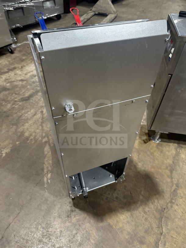 Dukers DCF3NG 40 lb. stainless steel deep fryer, natural gas, 3 tube burners, with basket hanger and back splash, on casters.