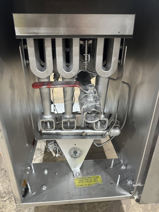 Dukers DCF3NG commercial deep fryer, stainless steel, 40 lb. capacity, 3 tube burners, on casters, natural gas, used.