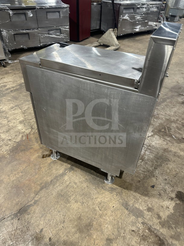 Pitco SRTE stainless steel electric pasta cooker/rethermalizer, 16.5 gal capacity, with backsplash, digital control, on legs.
