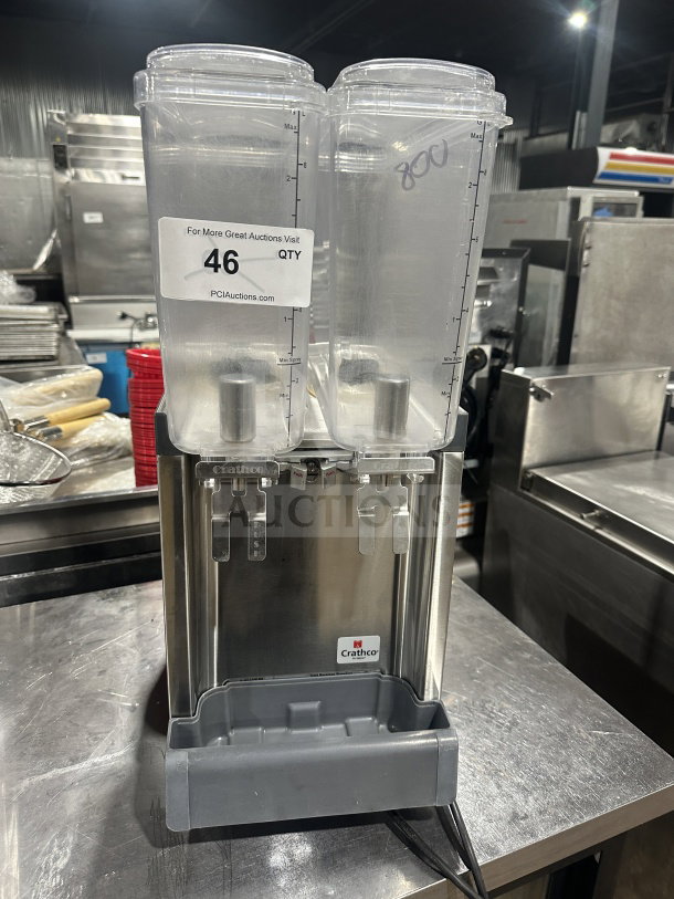 Crathco Classic Bubbler Series CS-2E/1D-16 beverage dispenser with clear hoppers, stainless steel body, and double drip trays.