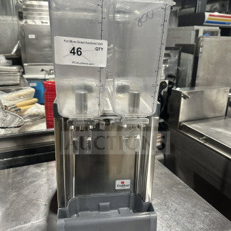 Crathco Classic Bubbler Series CS-2E/1D-16 beverage dispenser with clear hoppers, stainless steel body, and double drip trays.