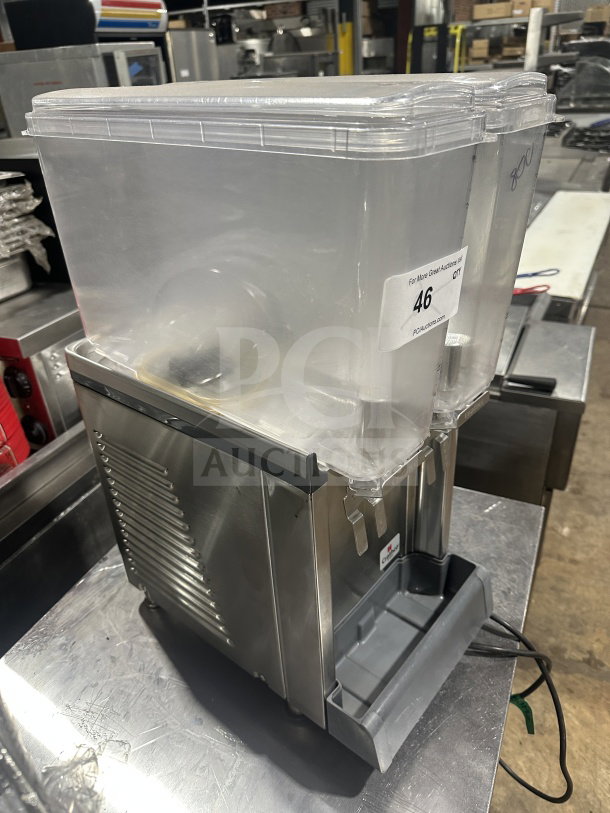 Crathco Classic Bubbler twin beverage dispenser, Model CS2E1D16, stainless steel, clear hoppers, double drip trays.