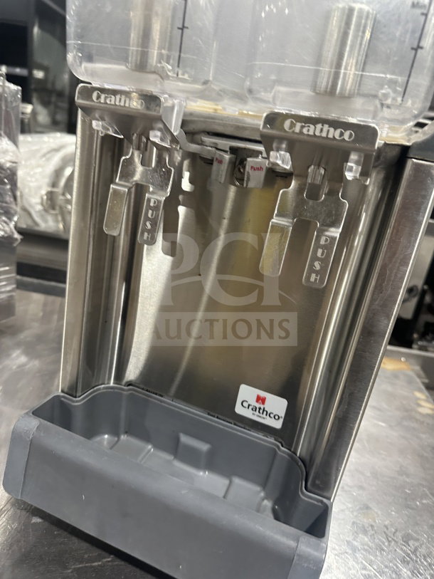 Crathco Classic Bubbler CS2E1D16 beverage dispenser, stainless steel, double hoppers, drip trays, legs, 115V, good condition.