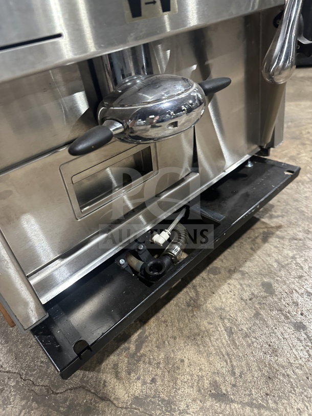 Turbo Chef Encore 2 commercial stainless steel oven, showing detail of control knobs and tray, in good condition.