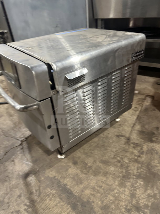 Stainless steel Turbo Chef Encore 2 countertop rapid cook oven on legs, model ENC31034258, 208/240V, 1 phase.