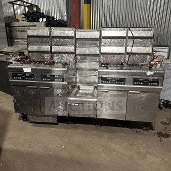 Frymaster commercial stainless steel 4-bay fryer system, model FMPH455SC, with digital controls, fry basket, and oil filter.