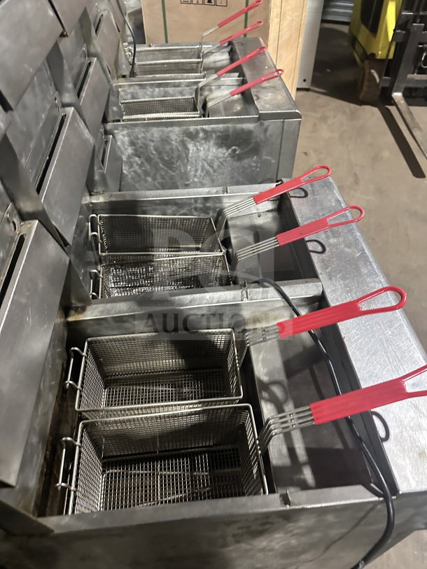 Frymaster 4-Bay Stainless Steel Fryer System, Model FMPH455SC, with digital control, basket hangers, and oil filter.